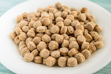 crispy bran in the white plate, healthy dieting snack