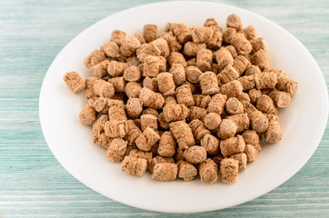 crispy bran in the white plate, healthy dieting snack