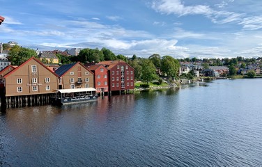 Fototapeta na wymiar Colorful Houses by the River in Trondheim, Norway