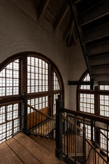 Derelict Historic Staircase with Large Windows - Abandoned Tewksbury State Hospital - Massachusetts