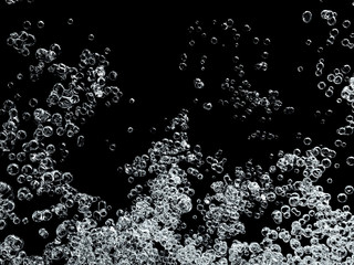 Soda water bubbles splashing and floating drop in black background represent sparkling and refreshing
