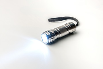 LED flashlight on a white background