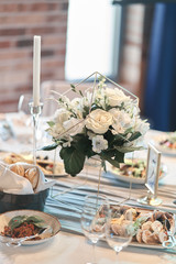 Table set for an event party or wedding reception.