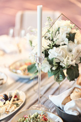 Table set for an event party or wedding reception.