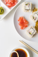 Sushi plate with sauce and wasabi