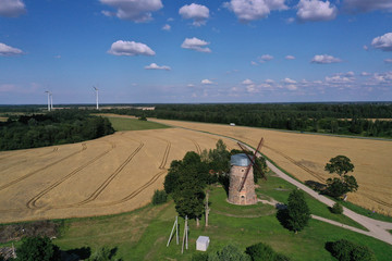 two generation - Old and New Windmills in farmland, Lithuania, aerial