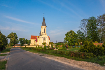 Fototapeta na wymiar Church in Pieczyska on a sunny day, Masovia, Poland