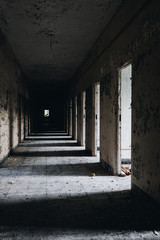 Derelict Empty Hallway with Open Doors - Abandoned Central Islip State Hospital - New York