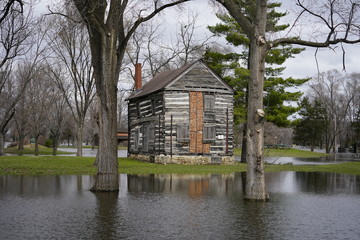 Old a banded house sits alone on a small island