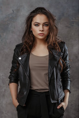 Young beautiful woman in a black jacket