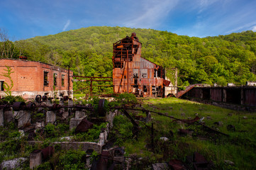 Fototapeta na wymiar Abandoned and Collapsing Cass Lumber Mill - Cass, West Virginia