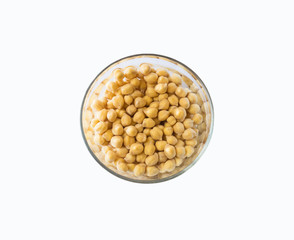 Chickpea soaked in water in a bowl on a white background. Chickpea isolated on white background. Chickpeas soaked in water. Chickpea in a bowl isolated on white. Top view.