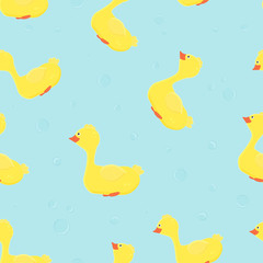 Seamless pattern with cute and funny ducks and bubbles on blue background. For baby shower design, wallpapers, decoration, fabric, textile and print, bathroom curtain.