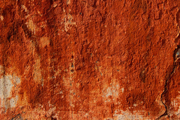 Blurred image of stone wall texture. Abstract texture background, brown colors.