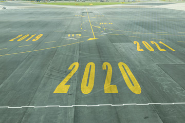 The 2020 number sign on the airport runway shows the coming New Year's reception soon.