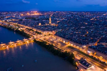 Fotobehang Illuminated Bordeaux city at night © JackF