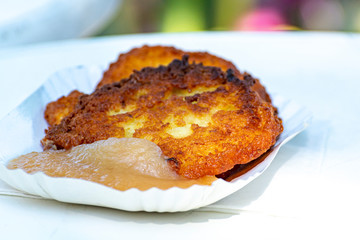 German vegetarian food, fresh baked potato pancakes with apple mousse