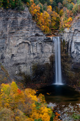 Fototapeta na wymiar Taughannock Falls - Long Exposure Waterfall in Peak Autumn / Fall Season - Ithaca, New York