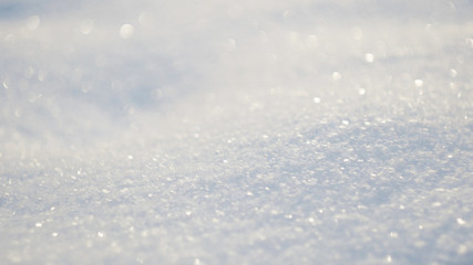 The surface of the sparkling fresh white snow. Frosty morning, free space for text.