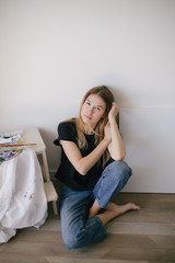 Woman painter in art studio