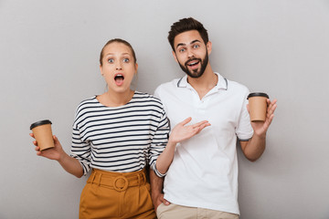 Beautiful young couple wearing casual clothing standing