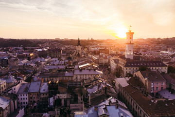 aerial view of sunset above european city