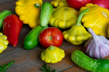 Vegetables on a wooden background close-up. Autumn rich harvest. Rural still life.