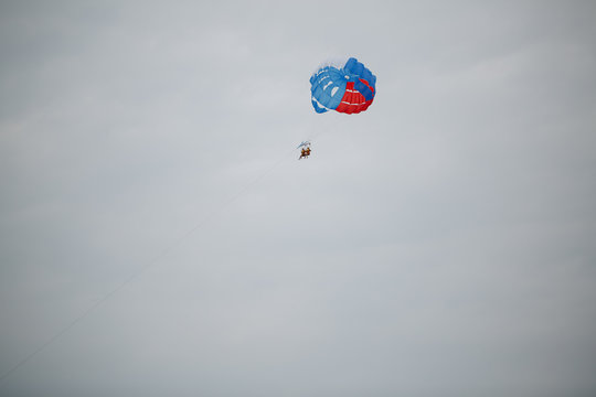 Riding on a parachute behind a boat Among the popular beach activities. One of the most popular sea activities.