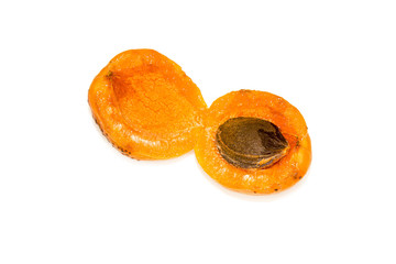 Apricot pits isolated on white background close-up