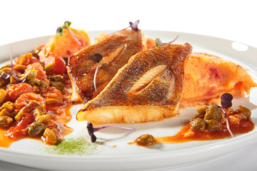 Pike Perch or Zander Fish Fillet on White Plate Isolated