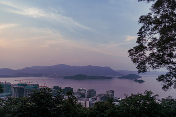 a panoramic top-down view of harbour sunset landscape in hong kong china