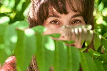 portrait of a woman in tree branches