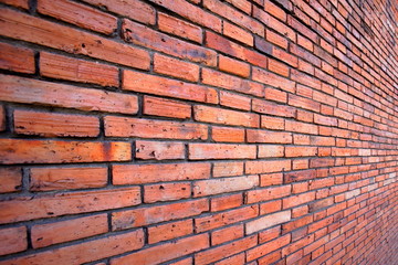 red background,red brick wall,Oblique angle