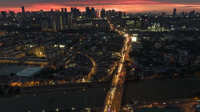 Stunning time lapse day to night at Metro Manila downtown business Center.