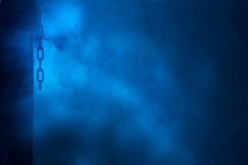 Blue colored smoke, wich was highlighted of night flashlight.