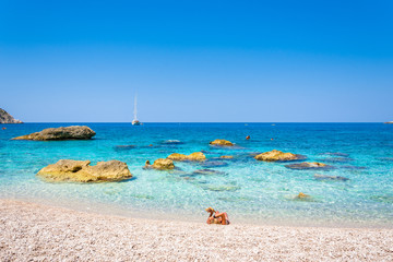 Fototapeta na wymiar Famous Petanoi beach in Kefalonia island, Greece.