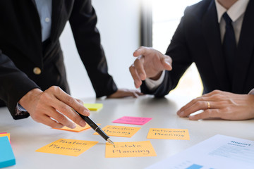 wealth management concept, business man and team analyzing financial statement for planning...