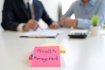 wealth management concept, business man and team analyzing financial statement for planning...