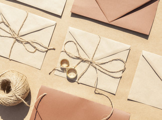 Top view wedding invitations in envelopes