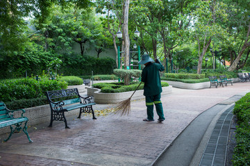 A street sweeper in the park.