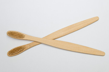 Bamboo toothbrushes isolated on the white background