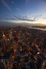 Two parallel streets, the 5th and 6th Avenue, converge to a common point in the distance, the World Trade Center