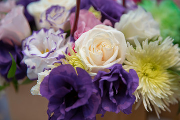 white, purple roses . Purple, white, yellow flowers. Purple, white, yellow flower bouquet .