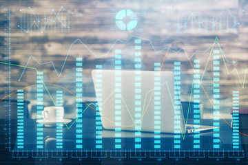 Financial graph colorful drawing and table with computer on background. Double exposure. Concept of...