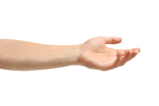 Young man held out hand on white background, closeup