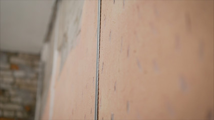 wall repair. Lighthouses on the walls. Installation of metal lighthouses, preparation for plaster