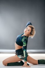 Sexy blonde woman on sport gym club