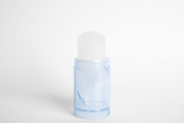 Fototapeta na wymiar Natural crystal alum stick deodorant on white background