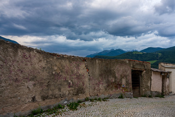 Thundercloud over Old Town of Brunek in Italy