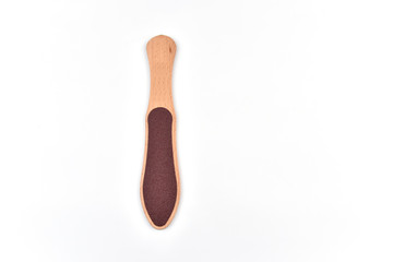 Wooden foot file on a white background